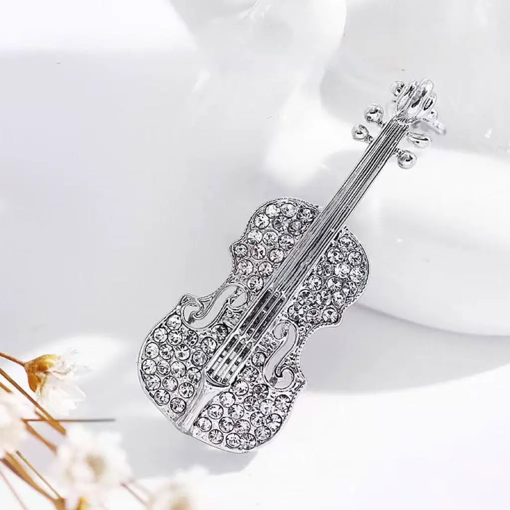 Prendedor violin strass plateado